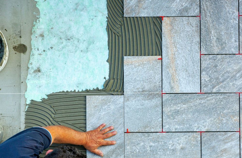 top-view-of-a-tiler-working-in-a-garden-.jpg
